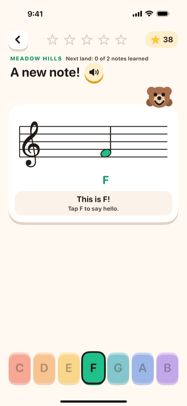 A new note: F on the treble staff, in green, with its name under it and only its own button lit